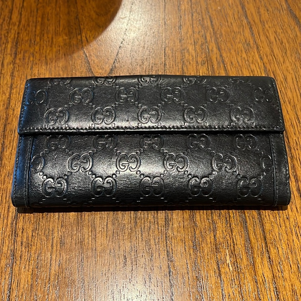 Gucci continental logo embossed black leather wallet